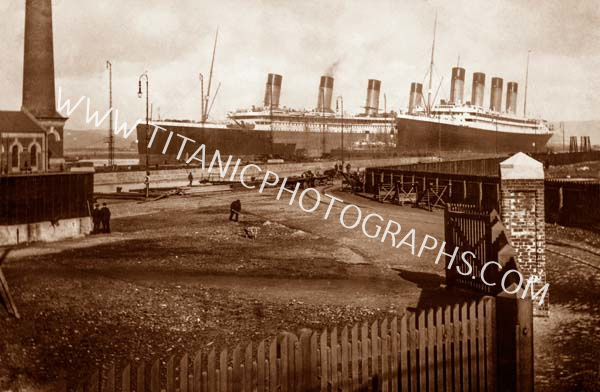 Titanic, left, her hull half-painted